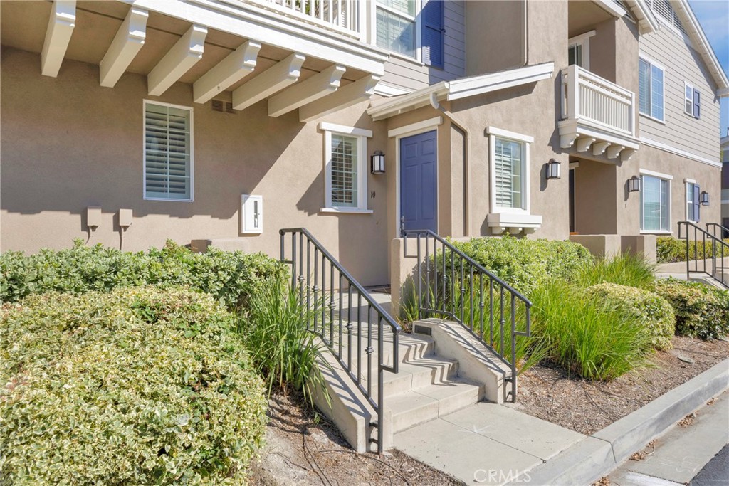 10 Agave Court Ladera Ranch, CA 92694 - Photo 2 of 36 a view of a house with a small yard and potted plants