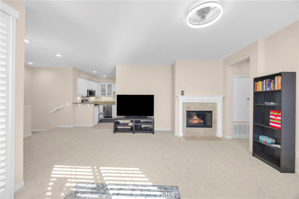 10 Agave Court Ladera Ranch, CA 92694 - Photo 7 of 36 a view of livingroom with furniture and a fireplace