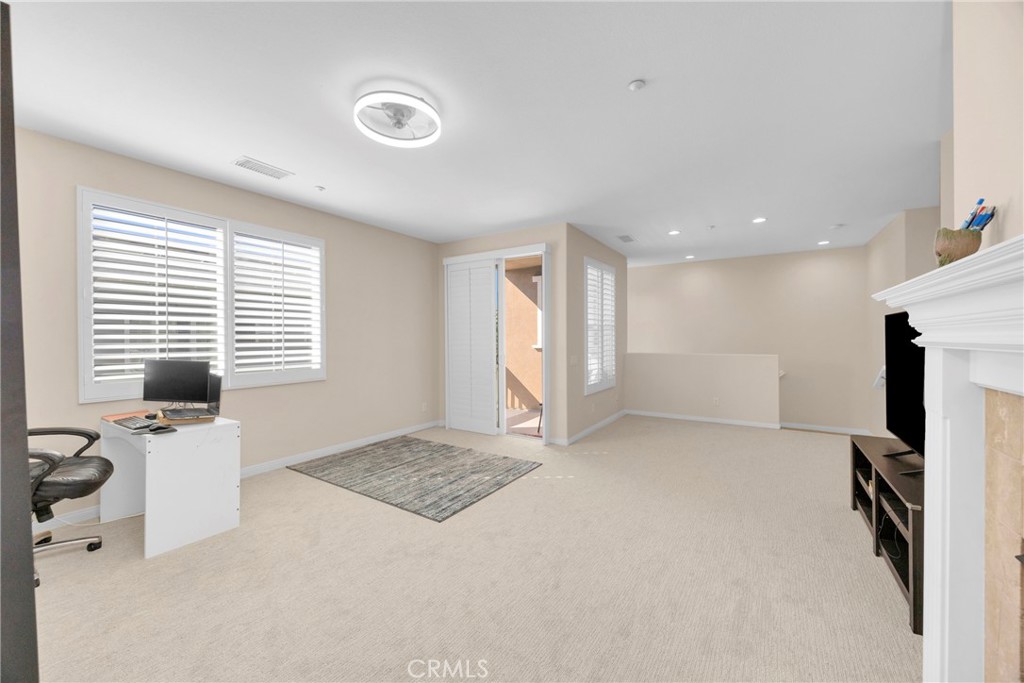 10 Agave Court Ladera Ranch, CA 92694 - Photo 8 of 36 a view of an empty room with a window