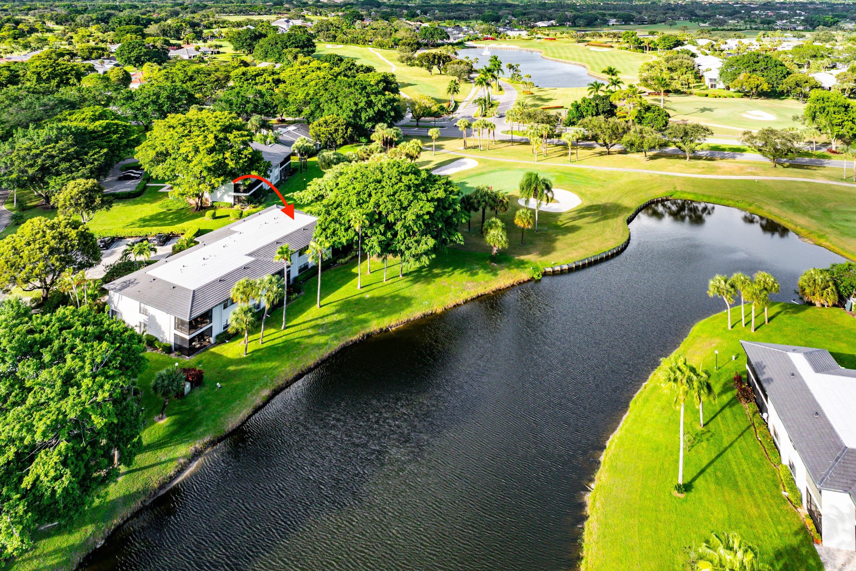a view of a lake with a yard