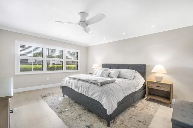 a living room with large windows