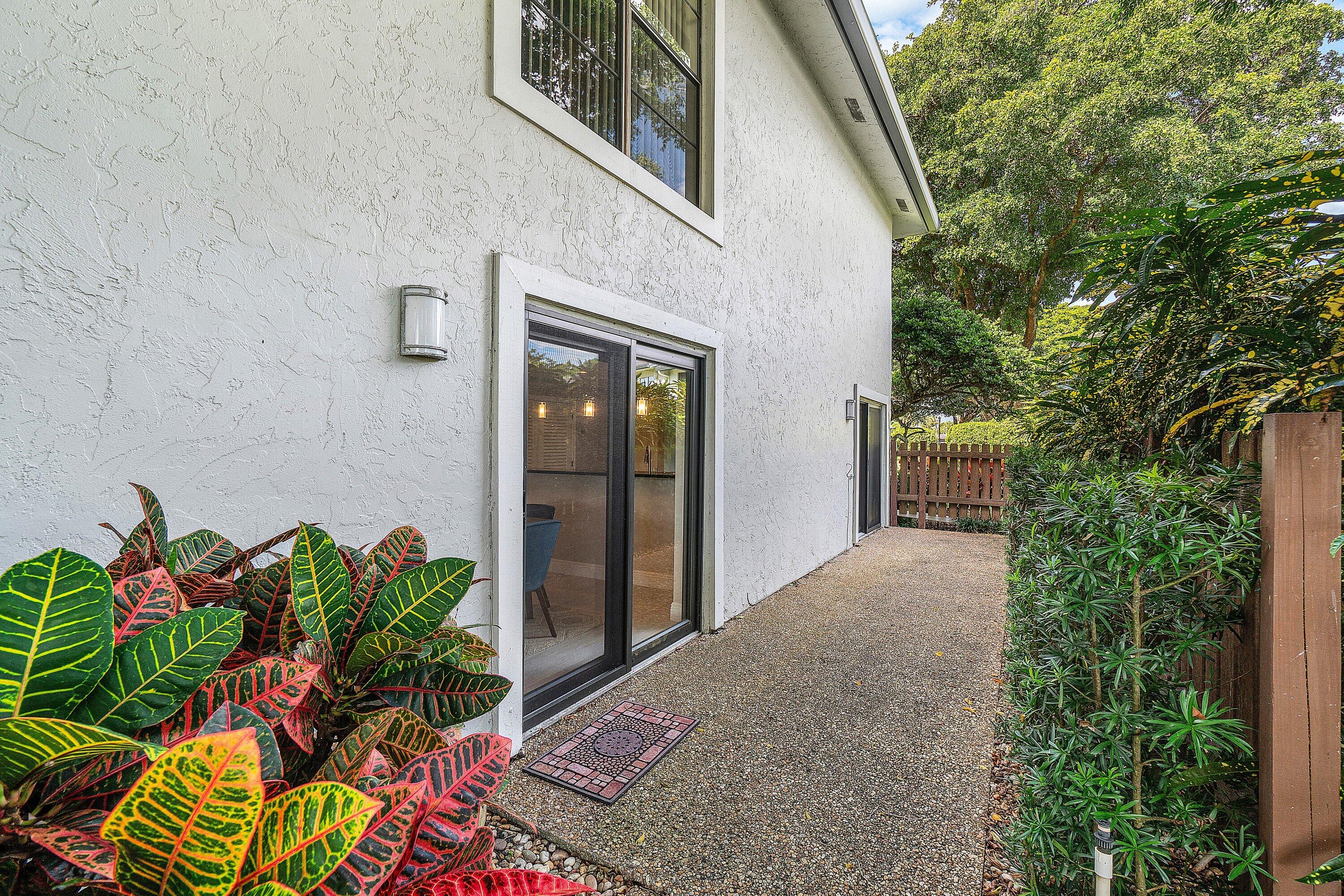 38 Southport Lane, Unit A Boynton Beach, FL 33436 - Photo 26 of 65 Side Patio