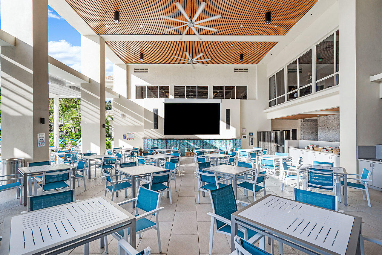 38 Southport Lane, Unit A Boynton Beach, FL 33436 - Photo 56 of 65 Casual Poolside Dining