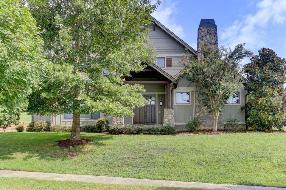 1340 Persimmon Road Loudon, TN 37774 - Photo 37 of 39 a front view of a house with a garden