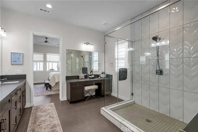 a room with a bed and a chandelier