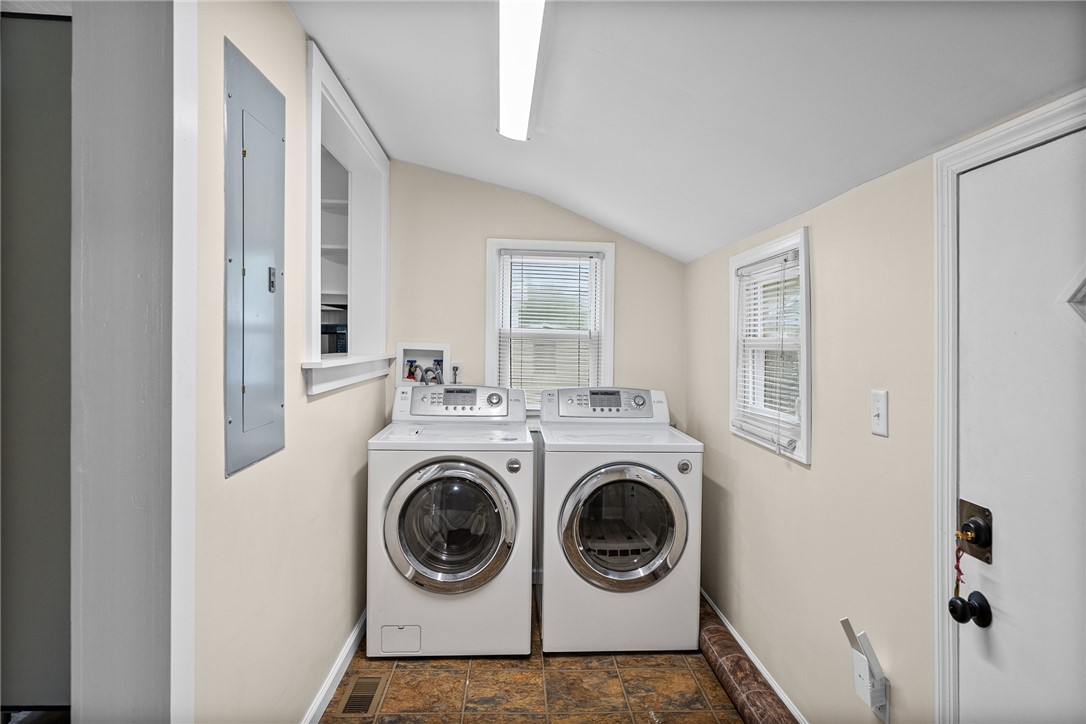 47 Square Street Pelzer, SC 29669 - Photo 23 of 29 Functional laundry room featuring tile flooring and dual windows for natural light.