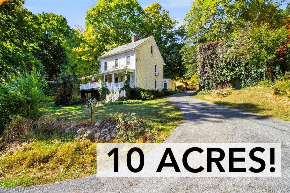 310 Oak Lane Newburgh, NY 12550 - Photo 1 of 34 a view of outdoor space with sign board