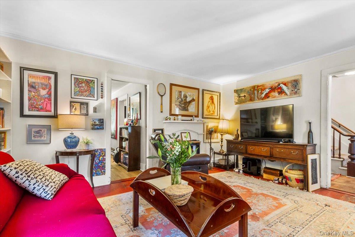 310 Oak Lane Newburgh, NY 12550 - Photo 23 of 34 a living room with furniture and a flat screen tv