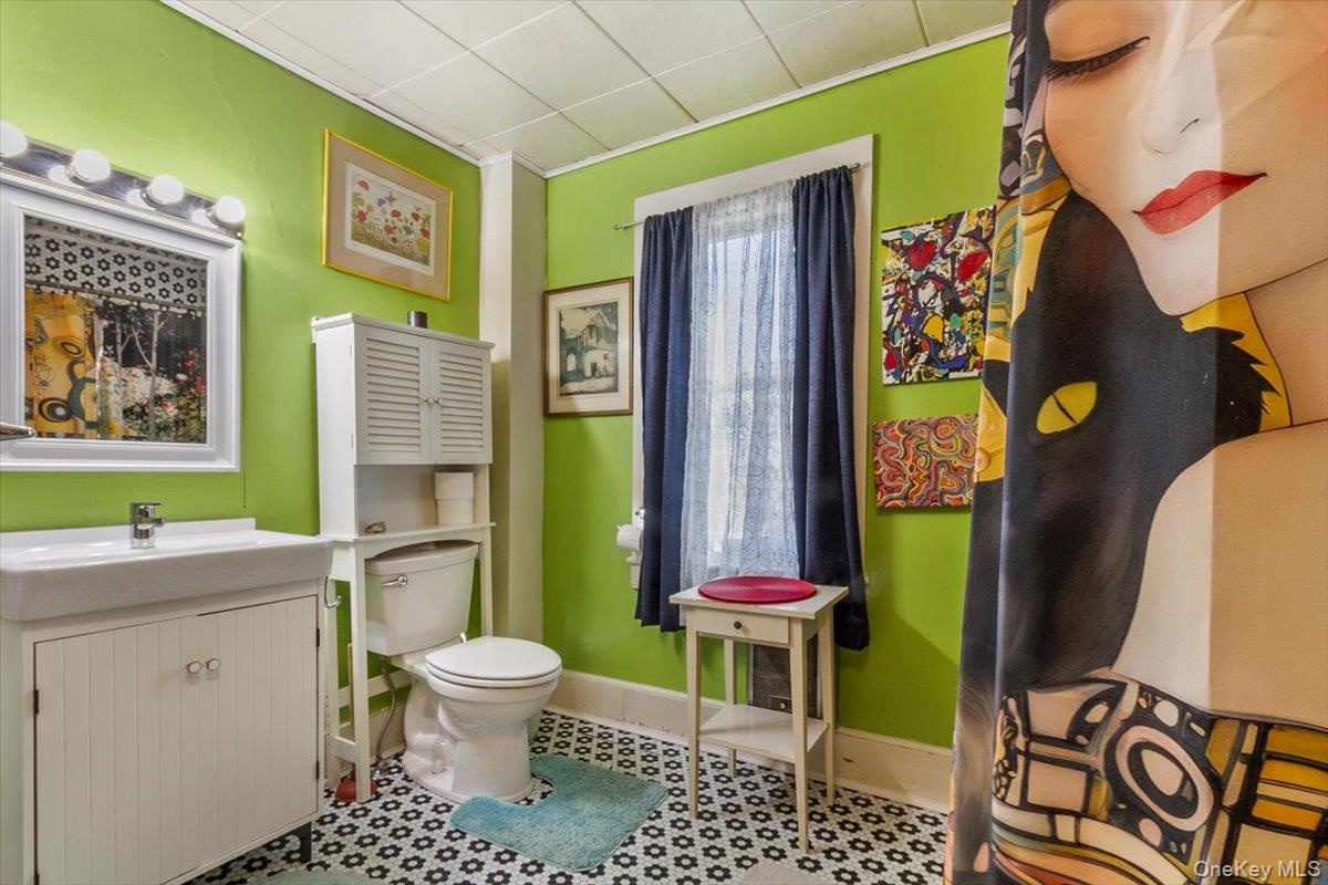 310 Oak Lane Newburgh, NY 12550 - Photo 26 of 34 a bathroom with a sink toilet and shower