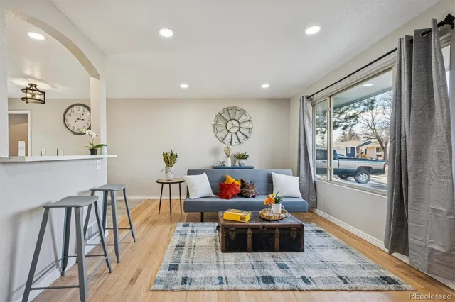 a living room with furniture and a window
