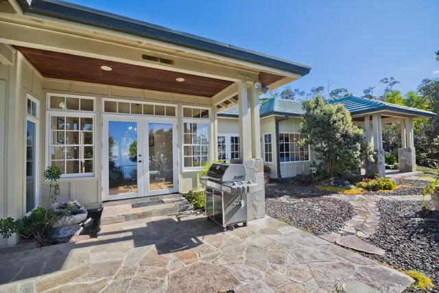 a view of a lounge chairs in the patio