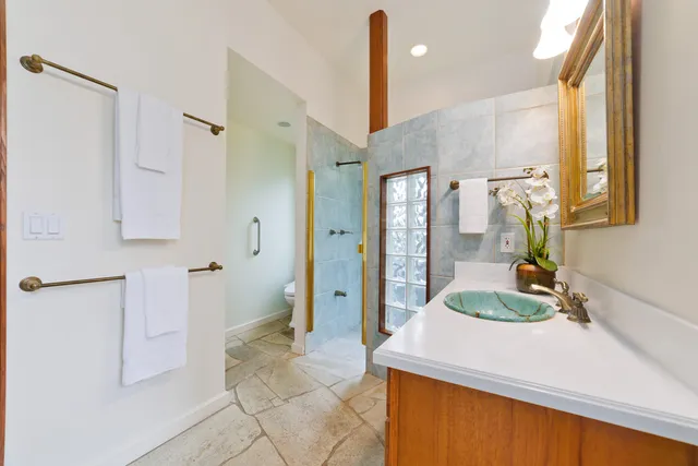 a kitchen with stainless steel appliances a refrigerator and a sink