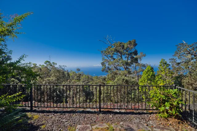 a view of a balcony with an outdoor space