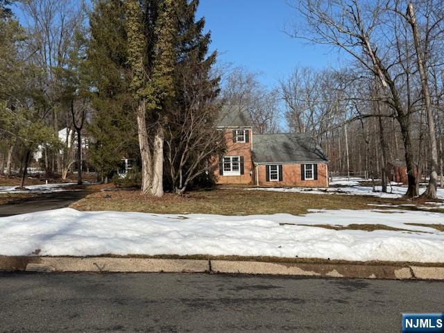 29 Wildwood Road Saddle River, NJ 07458 - Photo 2 of 2 a view of road with trees