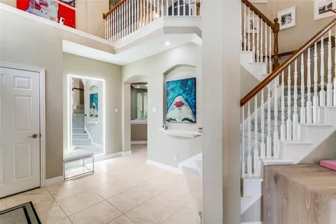a view of an entryway with staircase