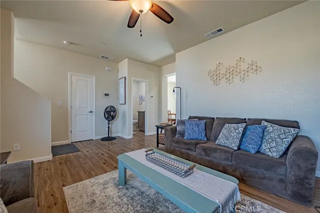 a living room with furniture and a couch
