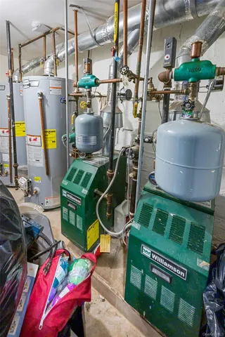 a living room with furniture and a mirror
