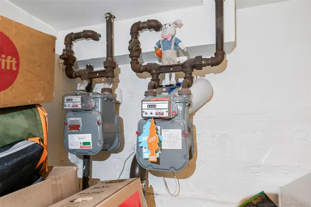 a view of a chairs and tables in the back yard of the house