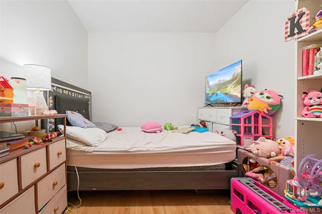 a bedroom with furniture and a bed