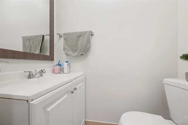 a bathroom with a sink and a toilet