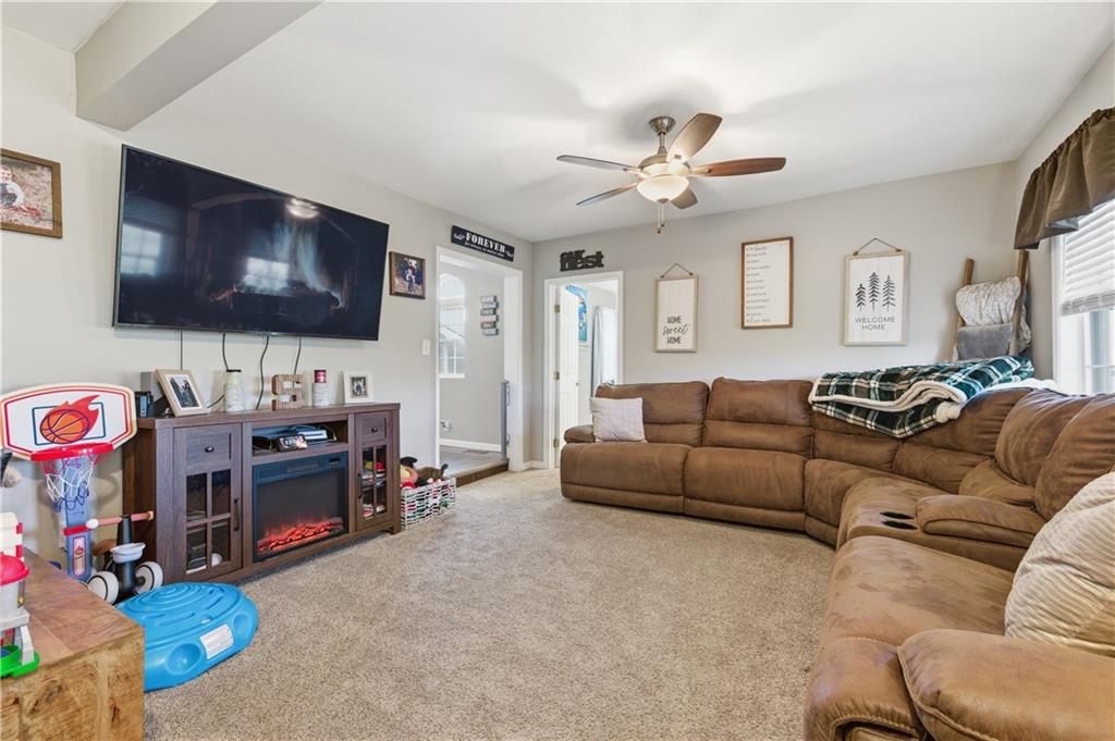 34 Cherry Farm Lane Dunbar, PA 15431 - Photo 15 of 22 a living room with furniture and a flat screen tv
