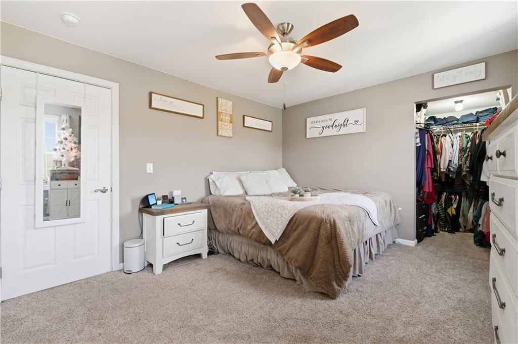 34 Cherry Farm Lane Dunbar, PA 15431 - Photo 20 of 22 a bed room with a bed and a ceiling fan