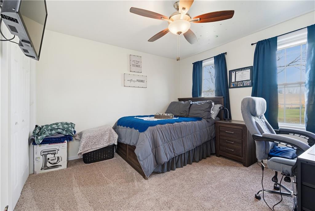34 Cherry Farm Lane Dunbar, PA 15431 - Photo 22 of 22 a bedroom with a bed and a window