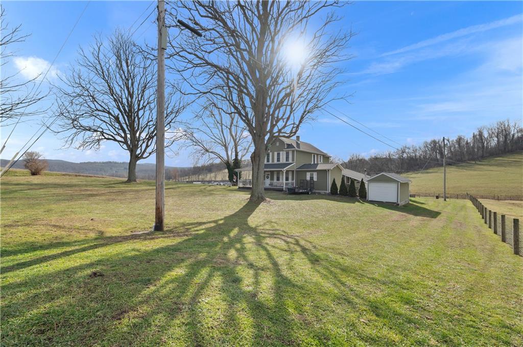 34 Cherry Farm Lane Dunbar, PA 15431 - Photo 7 of 22 a view of a yard with swimming pool