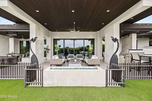 a view of stairs and yard with patio