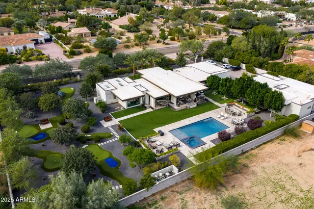 an aerial view of a house with a garden