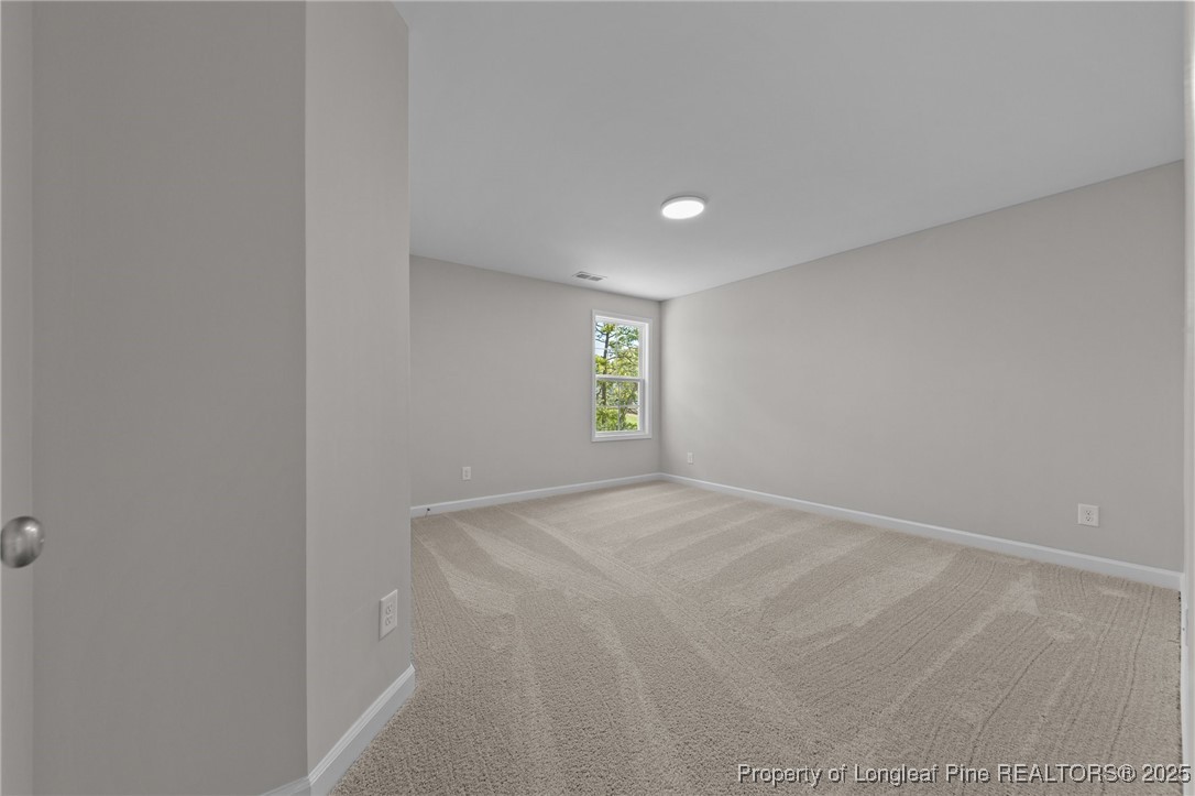 509 Watauga Lane Aberdeen, NC 28315 - Photo 20 of 29 a view of an empty room and window