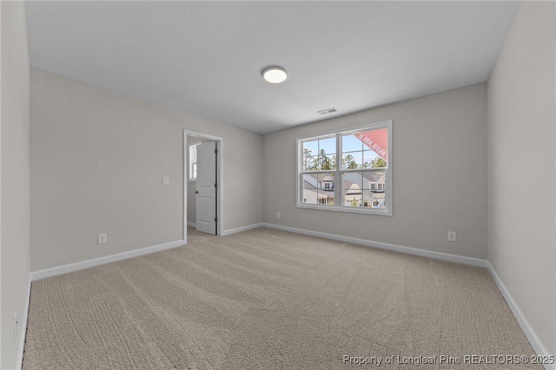 509 Watauga Lane Aberdeen, NC 28315 - Photo 23 of 29 an empty room with windows