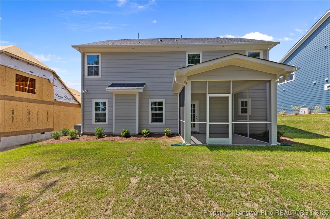 509 Watauga Lane Aberdeen, NC 28315 - Photo 3 of 29 a view of a house with a yard and large tree