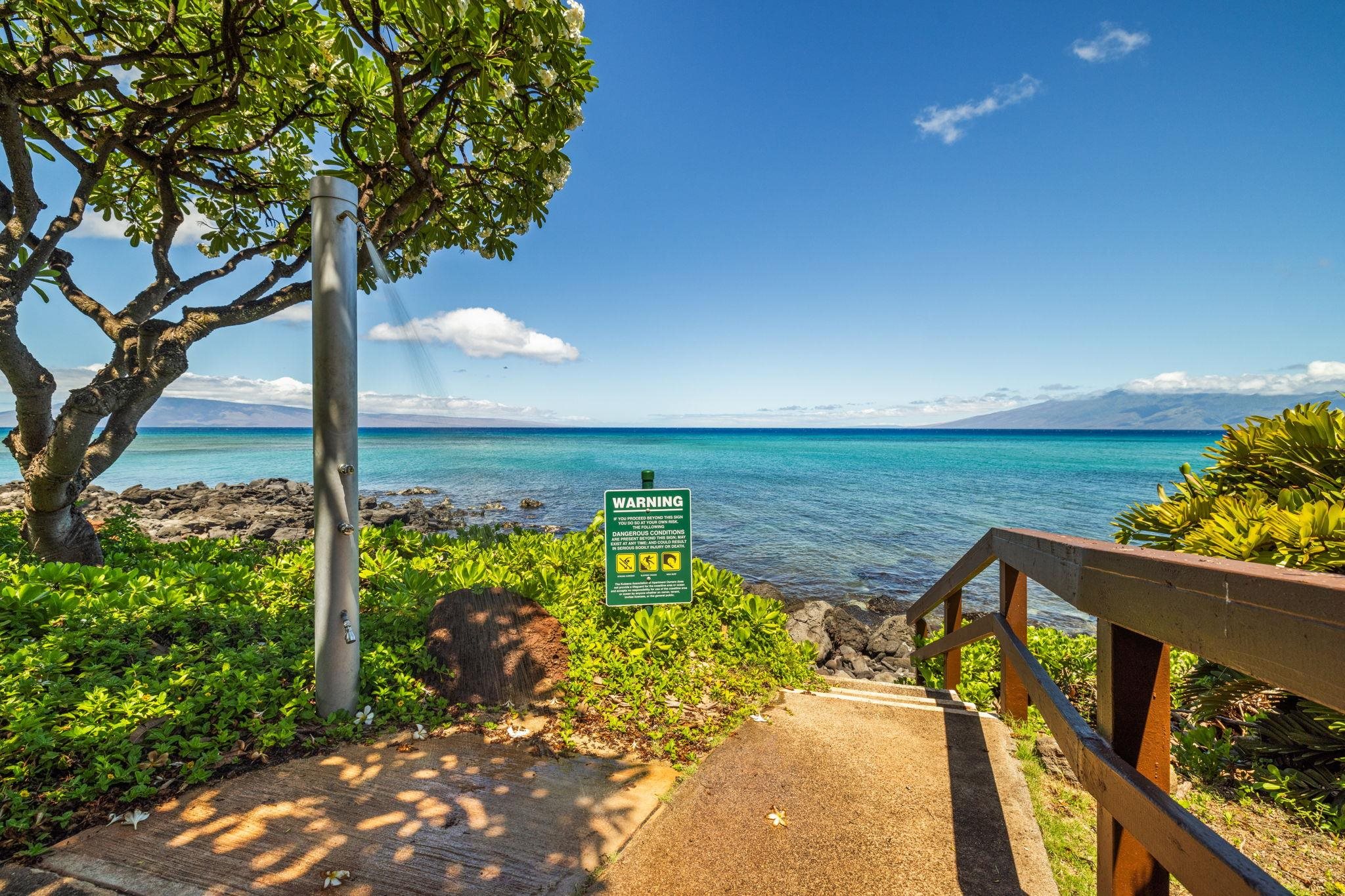 3959 Lower Honoapiilani Road, Unit A205 Lahaina, HI 96761 - Photo 21 of 36 a view of a lake from a balcony