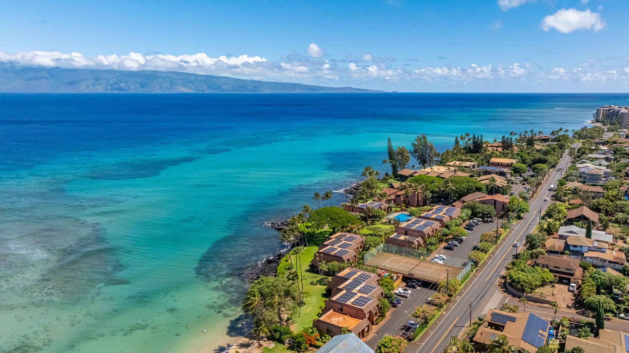 3959 Lower Honoapiilani Road, Unit A205 Lahaina, HI 96761 - Photo 28 of 36 a view of a houses with an ocean