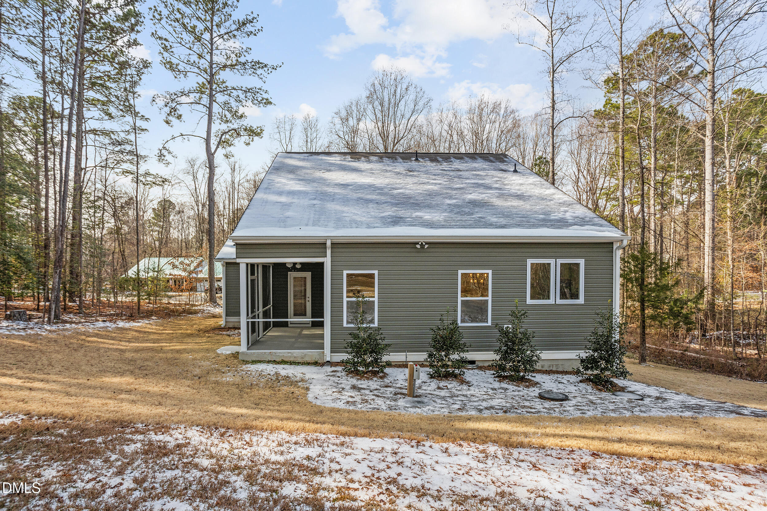 138 Sacred Fire Road Louisburg, NC 27549 - Photo 27 of 28 a view of a house with snow on the tree