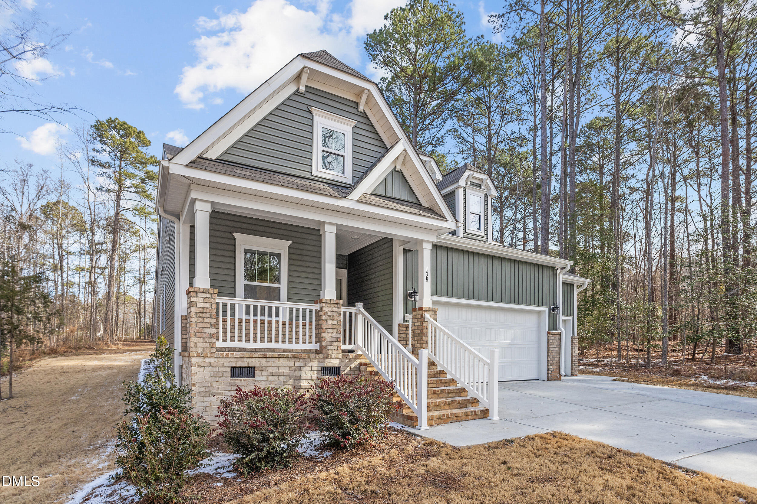 138 Sacred Fire Road Louisburg, NC 27549 - Photo 2 of 28 a front view of a house with a yard