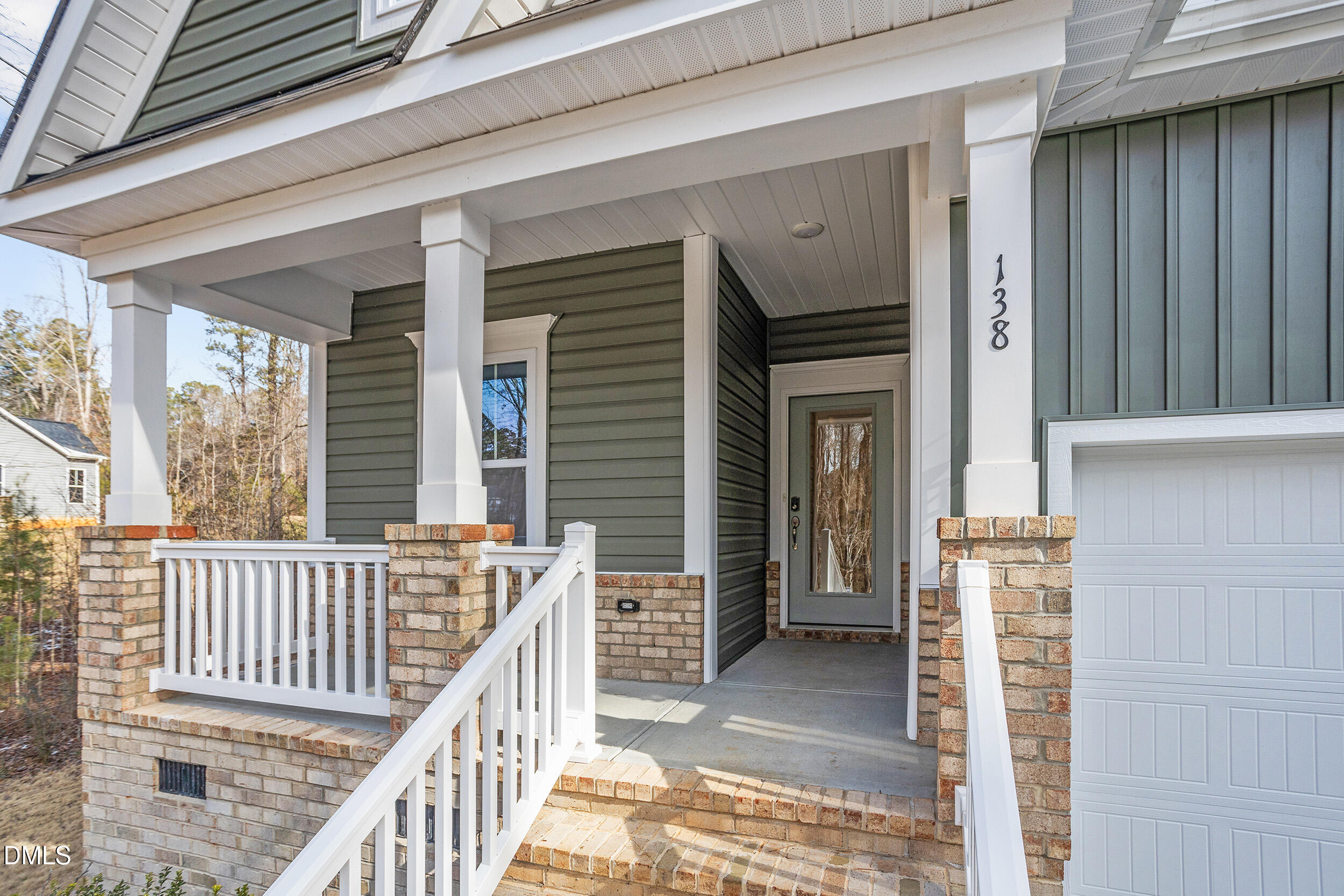 138 Sacred Fire Road Louisburg, NC 27549 - Photo 4 of 28 a view of a balcony with a porch