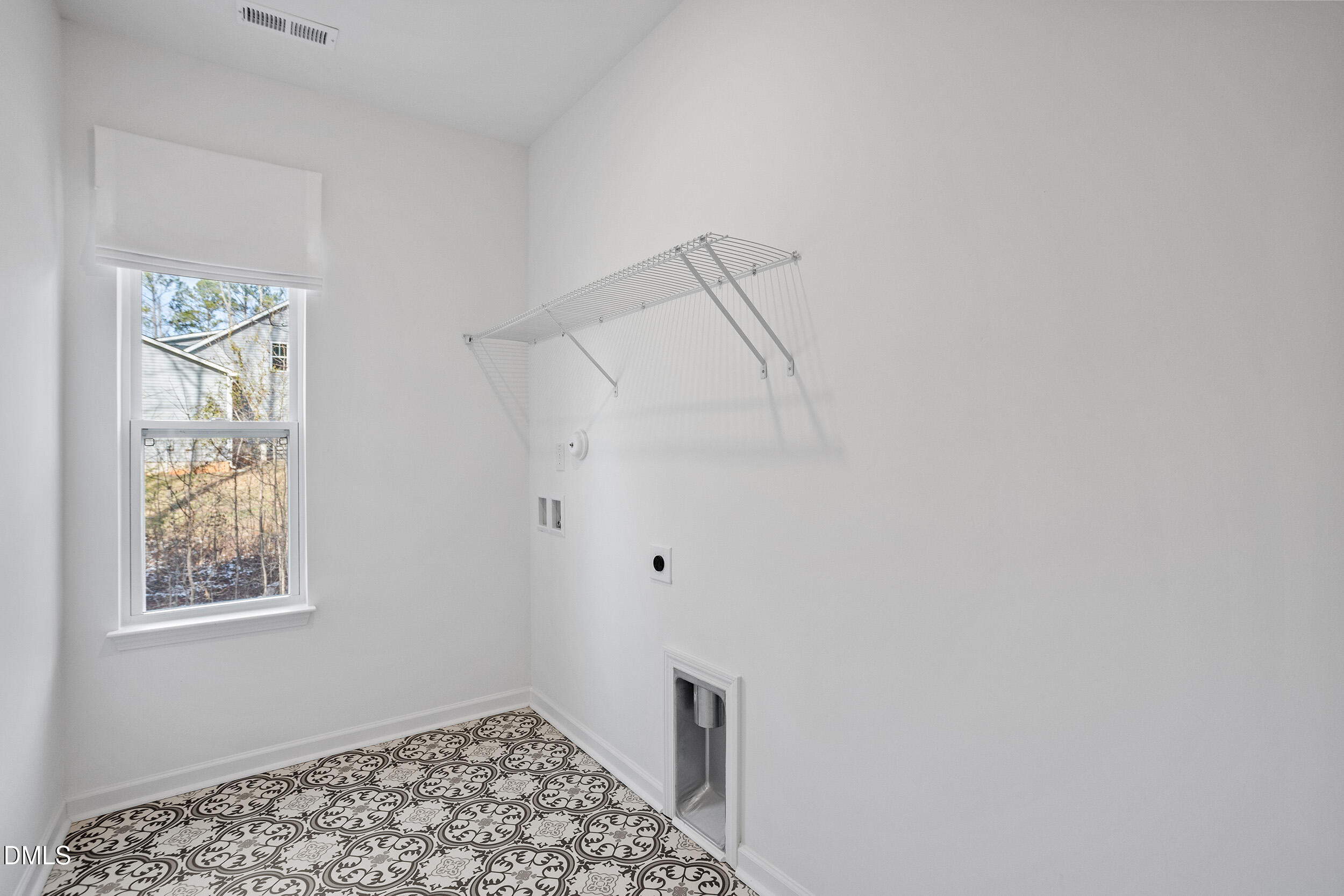 138 Sacred Fire Road Louisburg, NC 27549 - Photo 8 of 28 a bathroom with a window and a shower