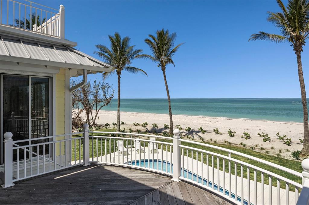 2979 Shore Lane Boca Grande, FL 33921 - Photo 12 of 57 a view of a balcony with lake view