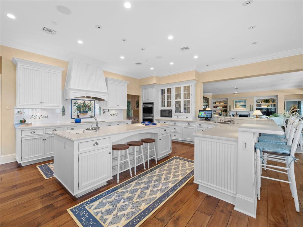 2979 Shore Lane Boca Grande, FL 33921 - Photo 26 of 57 a kitchen with stainless steel appliances granite countertop a lot of counter top space and cabinets