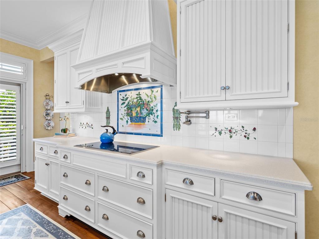2979 Shore Lane Boca Grande, FL 33921 - Photo 27 of 57 a kitchen with cabinets appliances and a window