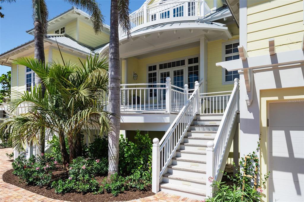 2979 Shore Lane Boca Grande, FL 33921 - Photo 3 of 57 front view of a house with a small yard