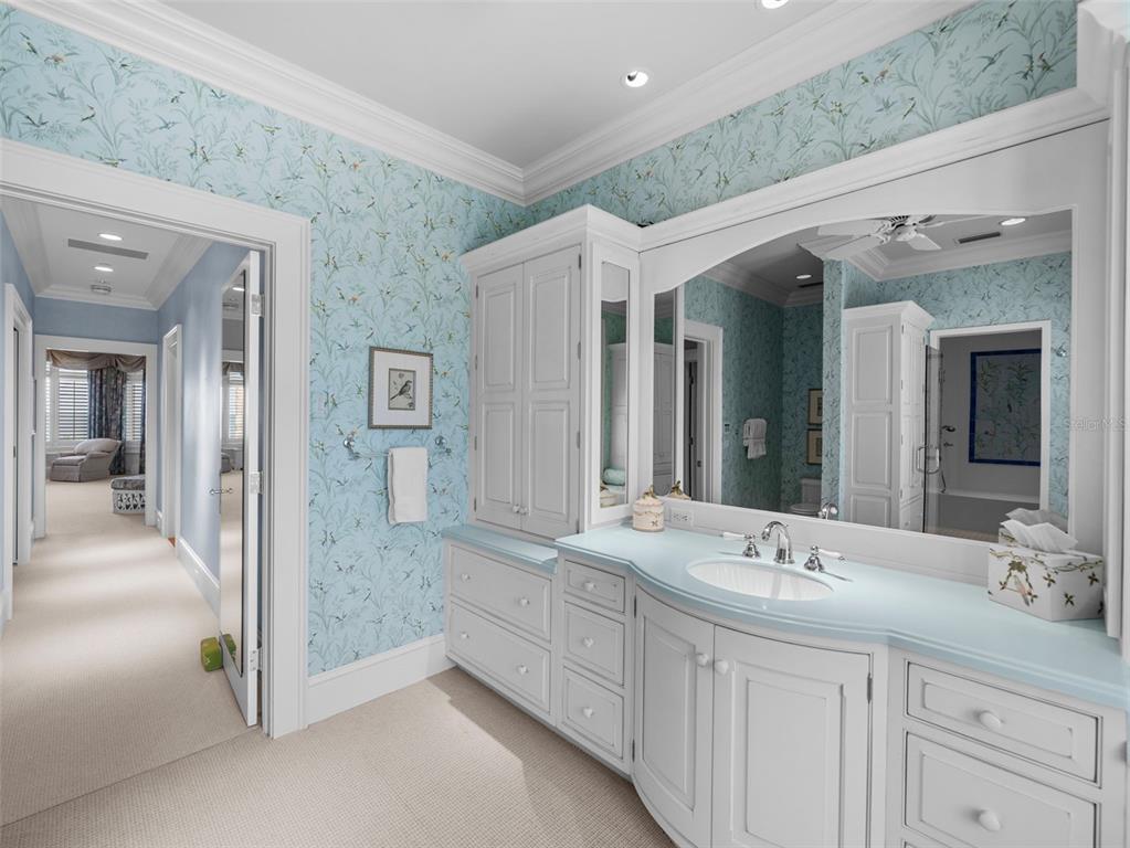 2979 Shore Lane Boca Grande, FL 33921 - Photo 39 of 57 a bathroom with a double vanity sink and mirror