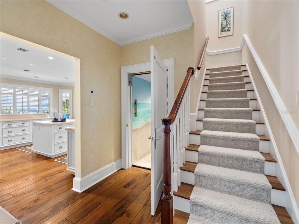 2979 Shore Lane Boca Grande, FL 33921 - Photo 42 of 57 a view of entryway and hall with wooden floor