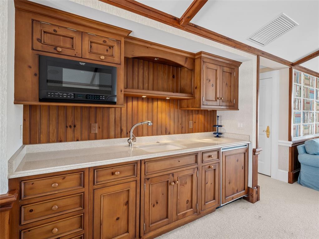 2979 Shore Lane Boca Grande, FL 33921 - Photo 48 of 57 a kitchen with a sink and cabinets