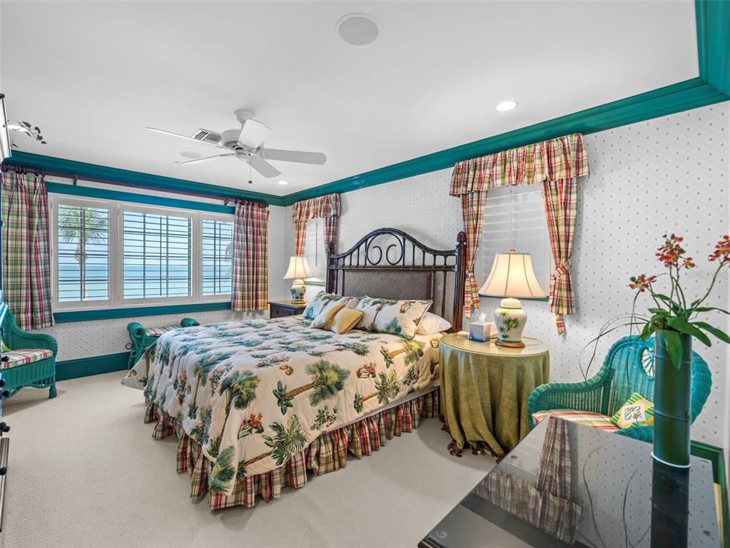 2979 Shore Lane Boca Grande, FL 33921 - Photo 52 of 57 a bedroom with bed and windows