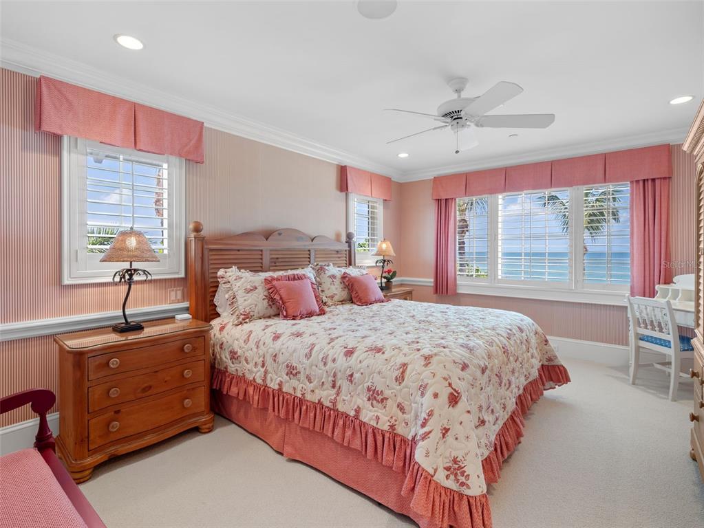 2979 Shore Lane Boca Grande, FL 33921 - Photo 53 of 57 a bedroom with a bed and window