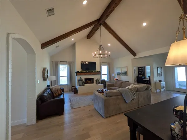 a view of a livingroom with furniture and window