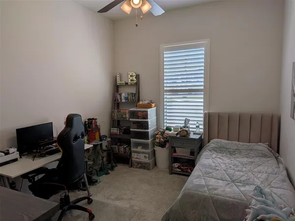 a view of a chairs and table in the balcony